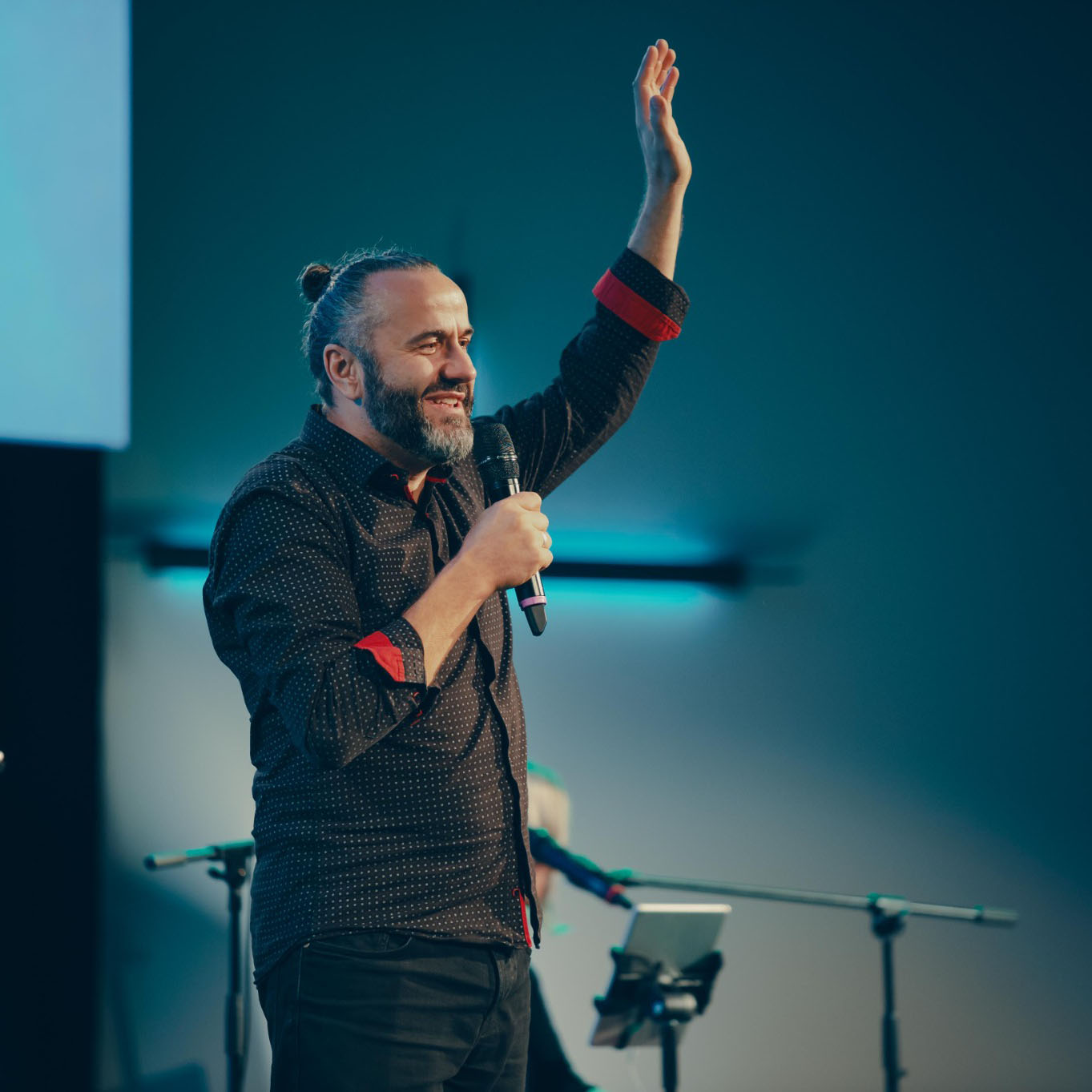 Matthias speaking at an event