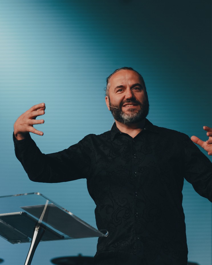 Matthias preaching with open hands